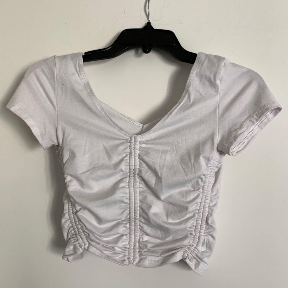 White cropped shirt.
